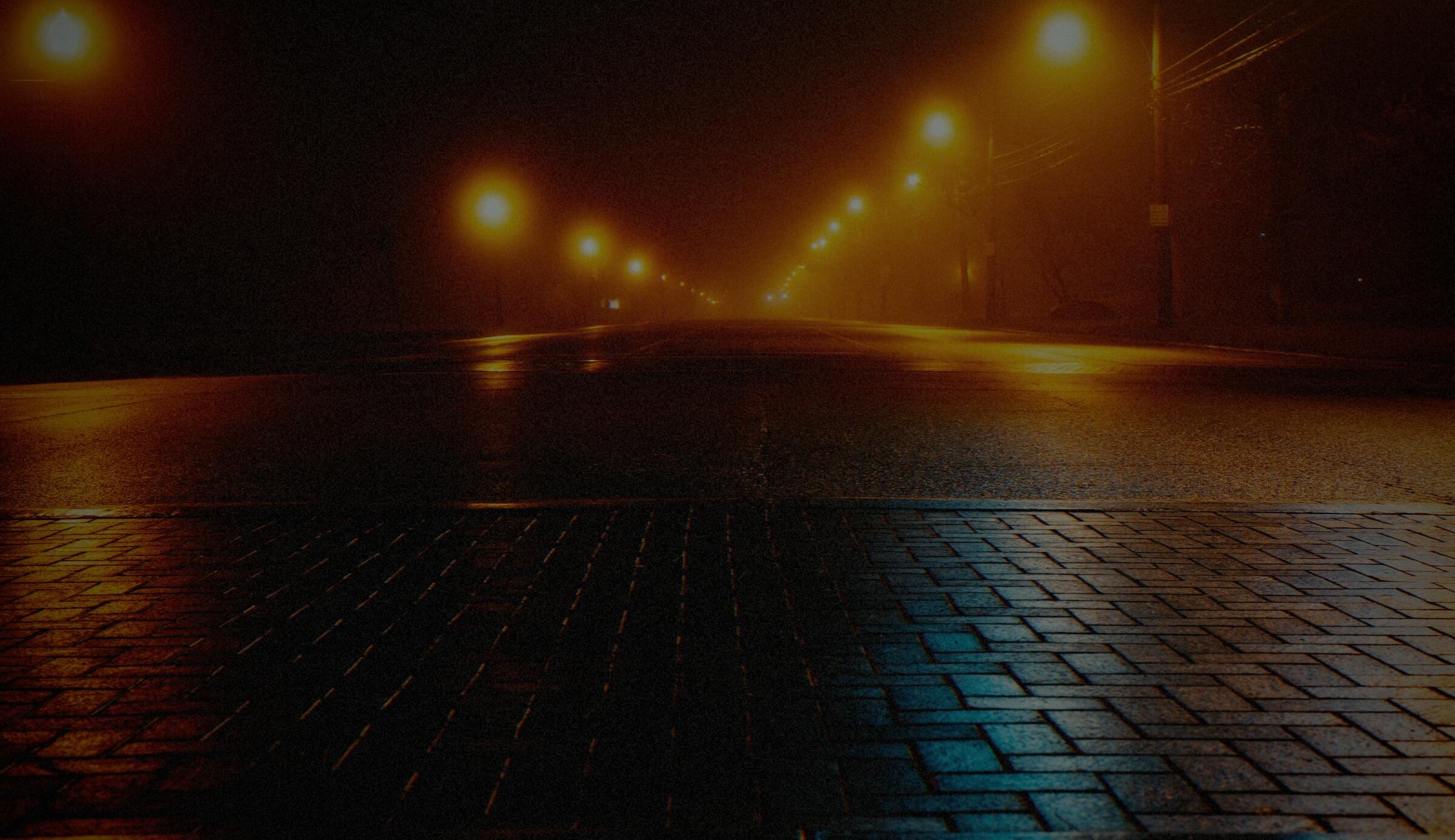 A photograph processed by the Bengala machine. Night neon that blooms into halos.